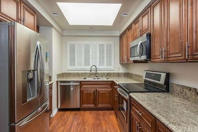 Beautiful light-filled kitchen.  Large center skyl
