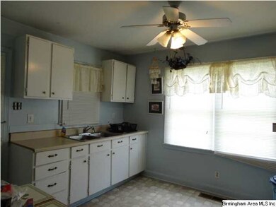 Kitchen..Large Enough for a Small Table and Chairs