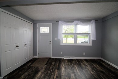 Living Room features large coat closet