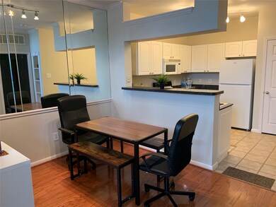 Nice dining area with lovely wood floors.