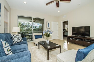 Living area with master bedroom to the back side.