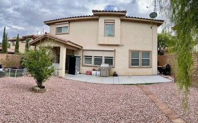 Back of property featuring a patio, a fenced backy