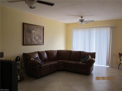 Large living space with tile floors throughout tha