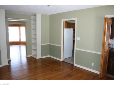Formal Dining room has hardwood floors, built-in s