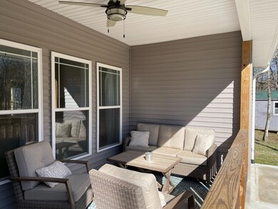Covered back porch for entertaining or hanging with the family!