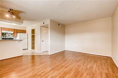 Unfurnished living room with ceiling fan, light w