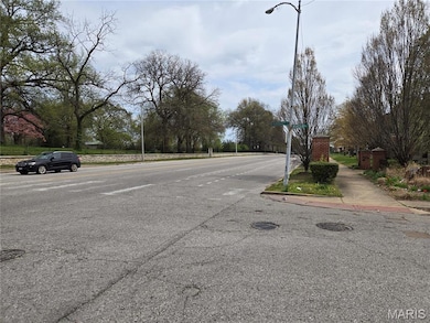 View of road with street lights and sidewalks