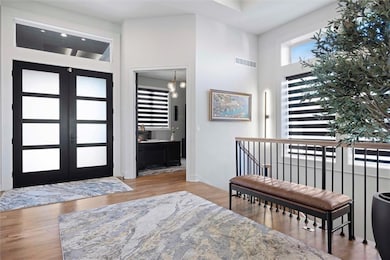 Entryway with double doors to an office on main level