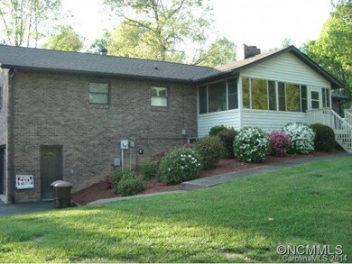 Sunroom and Rear View of home
