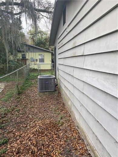 Left side of home. Fenced in and outside air conditioning unit