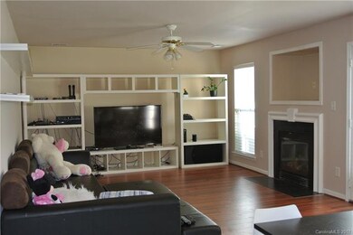 Family room with a fireplace.