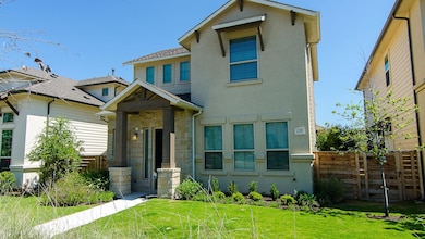 View of front of property with stone siding and s
