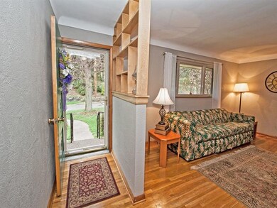 Gleaming Hardwood Floors greet you in the 