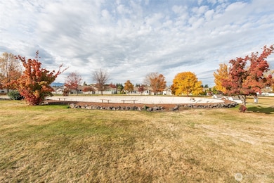 Parklike Greenbelt with Water Feature Views