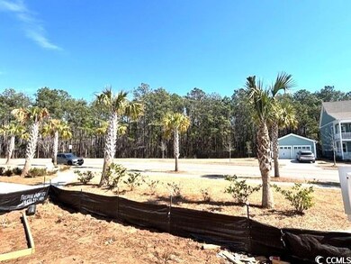 View of yard with a garage