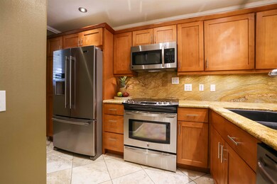 Large double basin sink.  Stainless appliances mak