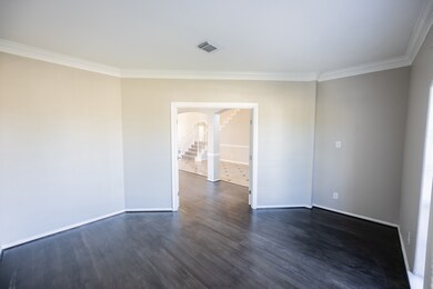Gorgeous floors and crown molding.