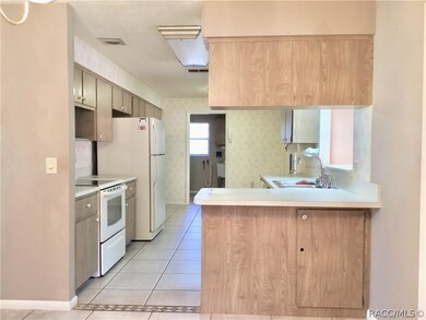 Breakfast bar opens to dining room area