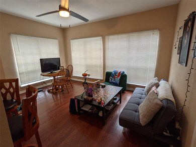 Living area featuring wood finished floors and a 