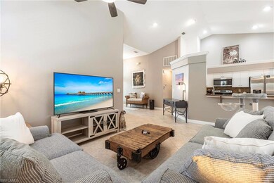 Great Room with high vaulted ceiling, a ceiling fan, and recessed lighting Open to Kitchen