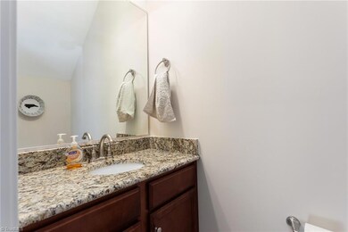 Downstairs Half Bath with Granite Countertops!