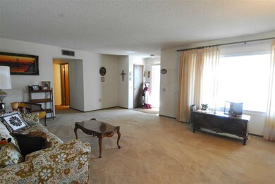 LIVING ROOM AND ENTRY