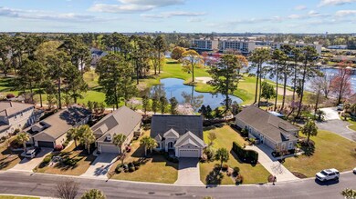 Bird's eye view with a water view and a residential view