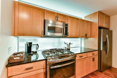 Windows above and below the cabinets adds abundant