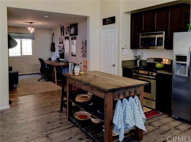 Looking from the kitchen into the office/recreatio