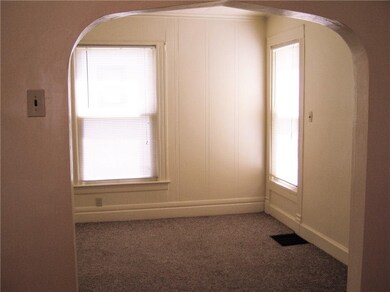 arch doorway into the living room