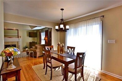 Sliding glass doors lead to the back patio and offer an abundance of natural lighting into the morning room.