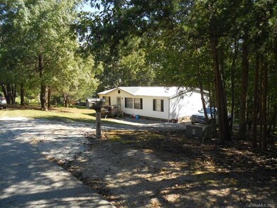 Neighboring property on the left side of the lot. 