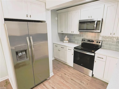 Quartz Counter Tops, High End Stainless Steel Appliances, Ceramic Tile Backsplash