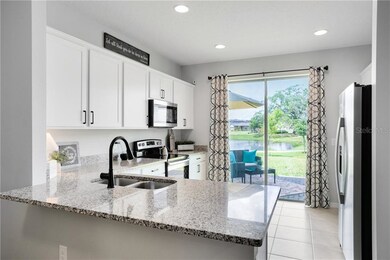 BEAUTIFUL KITCHEN WITH GRANITE COUNTERS AND STAINL