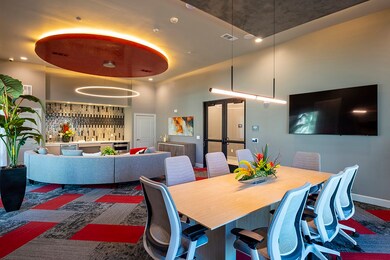 Business center with conference table with present