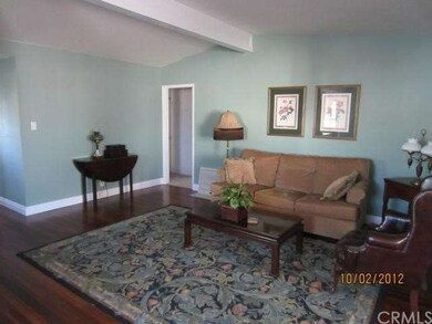 Large formal living room with Brizilian teak hardw