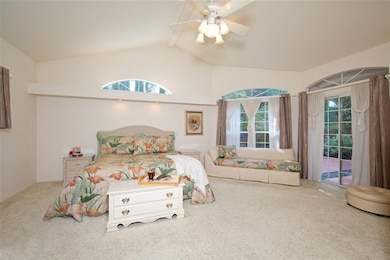 HUGE master bedroom with fireplace and doors onto 