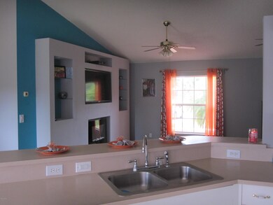 Kitchen Overlooks Family Room