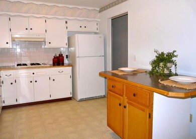 Large eat in kitchen.  Refrigerator stays.