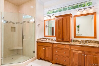 Master bath- solid cherry cabinets, spa shower