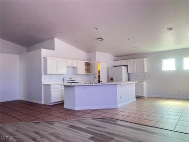 Kitchen with visible vents, fridge with ice dispen