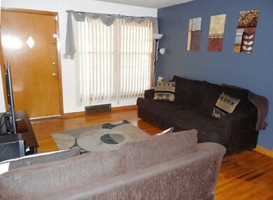 Wood floors in front room, dining room, hallway, a