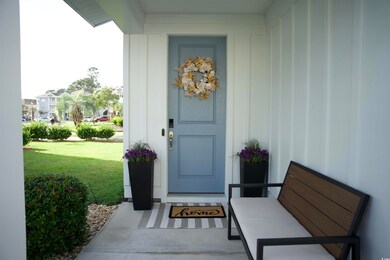 View of front entry with a large porch