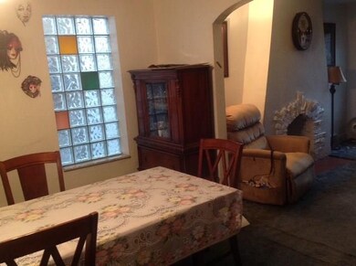 Spacious diningroom is furnished with a table for 