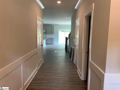 Cove crown molding, craftsman trim and luxury viny