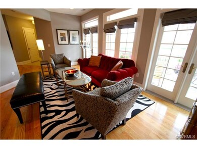 Living room opens to veranda through (3) sets of F