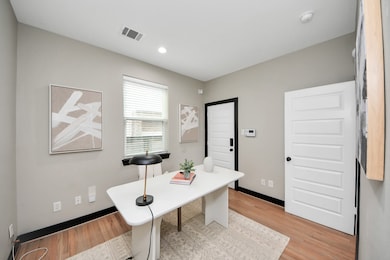 The first floor bedroom can be used as a home offi