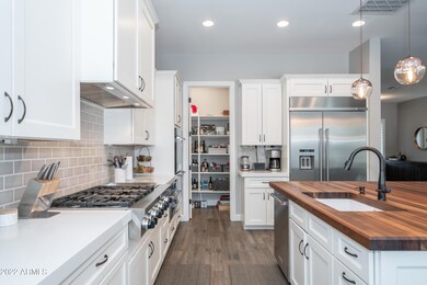 Built in fridge and walk in pantry