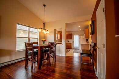 Dining area toward kitchen.