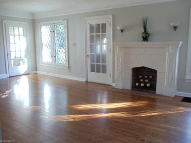 LARGE LIVING ROOM AREA WITH FIREPLACE, FRESHLY PAI